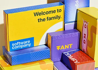 Collection of colorful custom printed mailer boxes with branded designs by Packwire